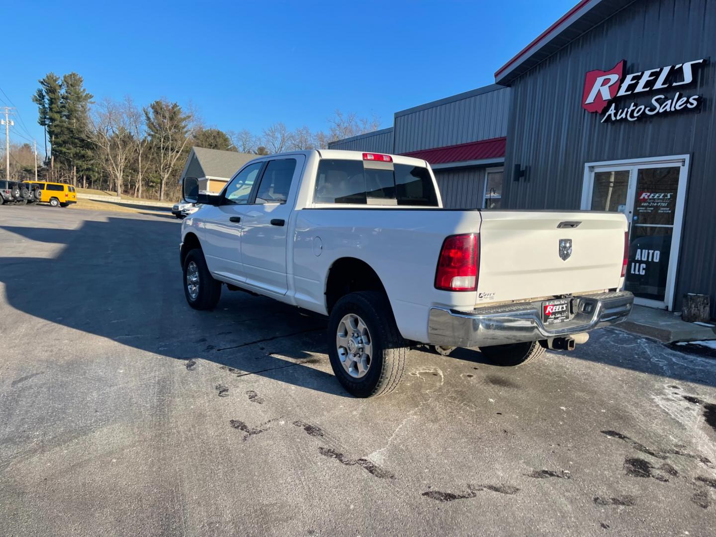 2016 White /Black RAM 2500 Outdoorsman Crew Cab SWB 4WD (3C6UR5DL4GG) with an 6.7L I6 OHV 24V TURBO DIESEL engine, 6A transmission, located at 11115 Chardon Rd. , Chardon, OH, 44024, (440) 214-9705, 41.580246, -81.241943 - Photo#12